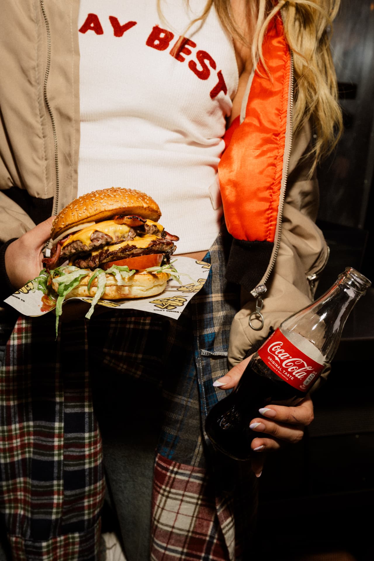 Handheld double cheeseburger lifestyle photography, Leeds