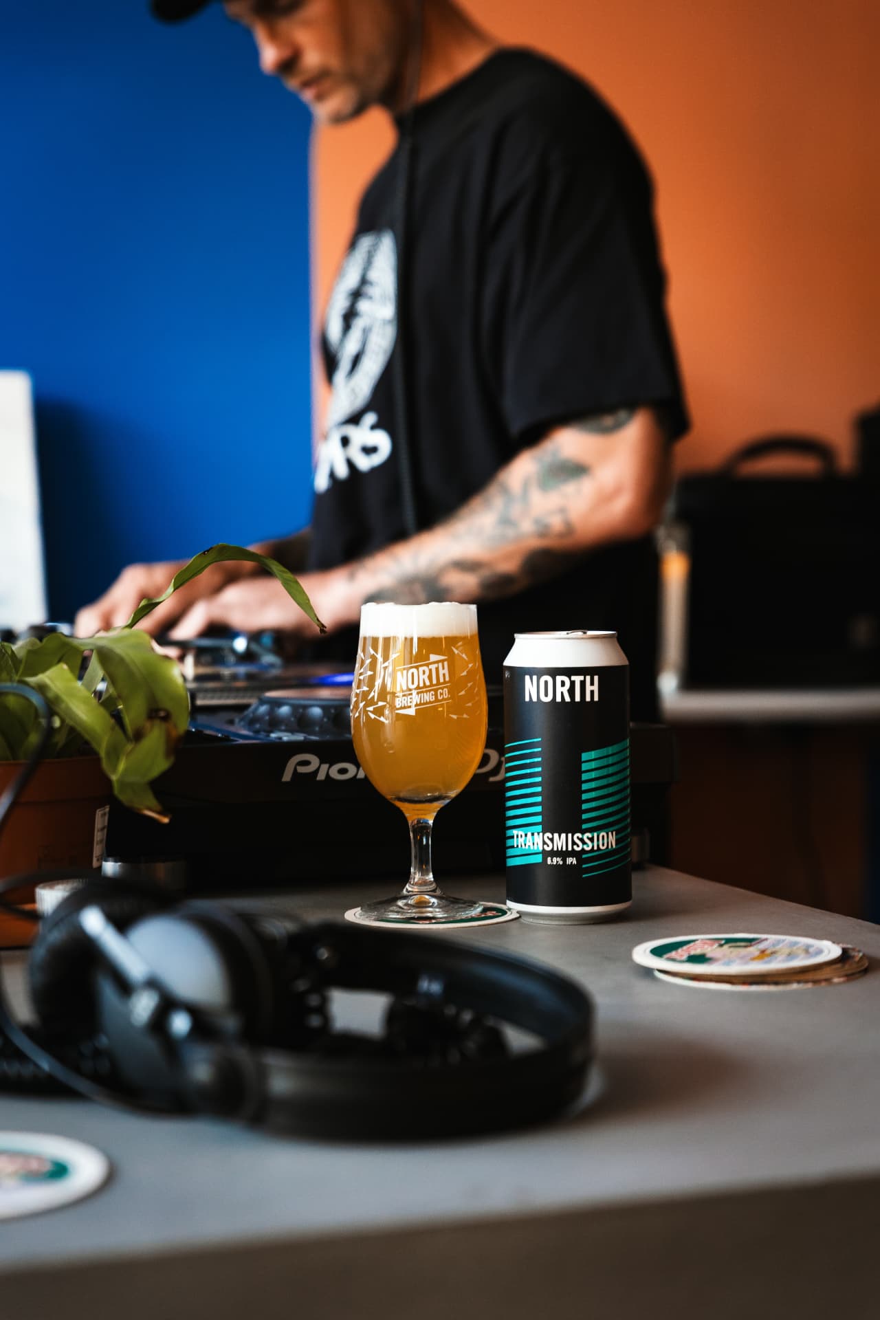 North Brewing Transmission IPA with DJ decks, taproom photography