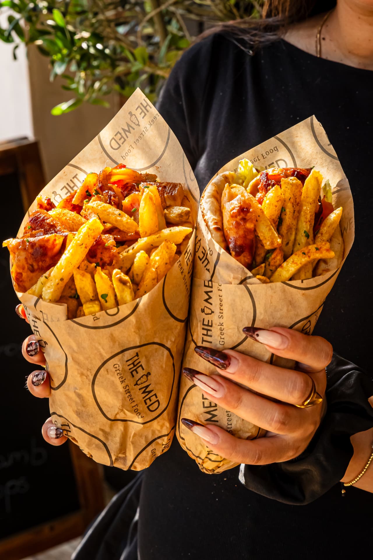 Greek street food gyros wraps loaded with fries, The Med